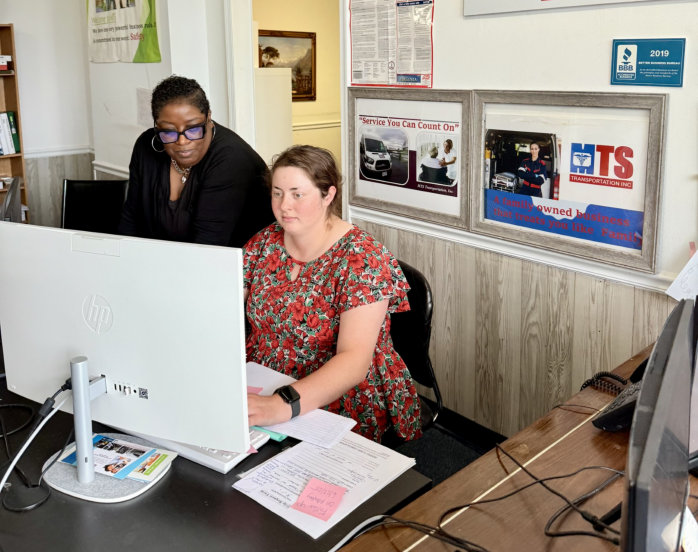 two women working in office